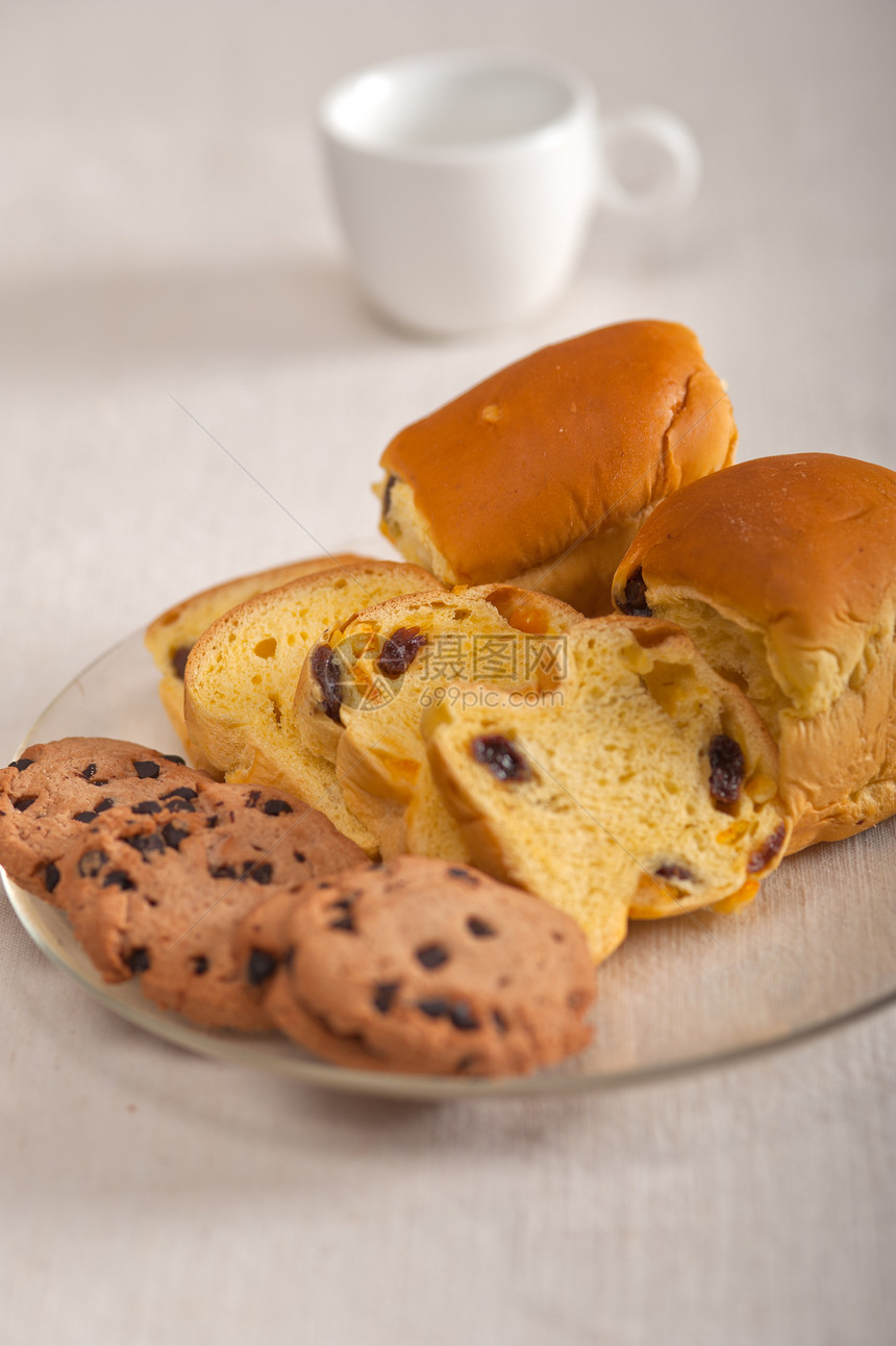 甜食面包和饼干的选择面团面包团体桌子咖啡早餐营养美食包子糕点图片