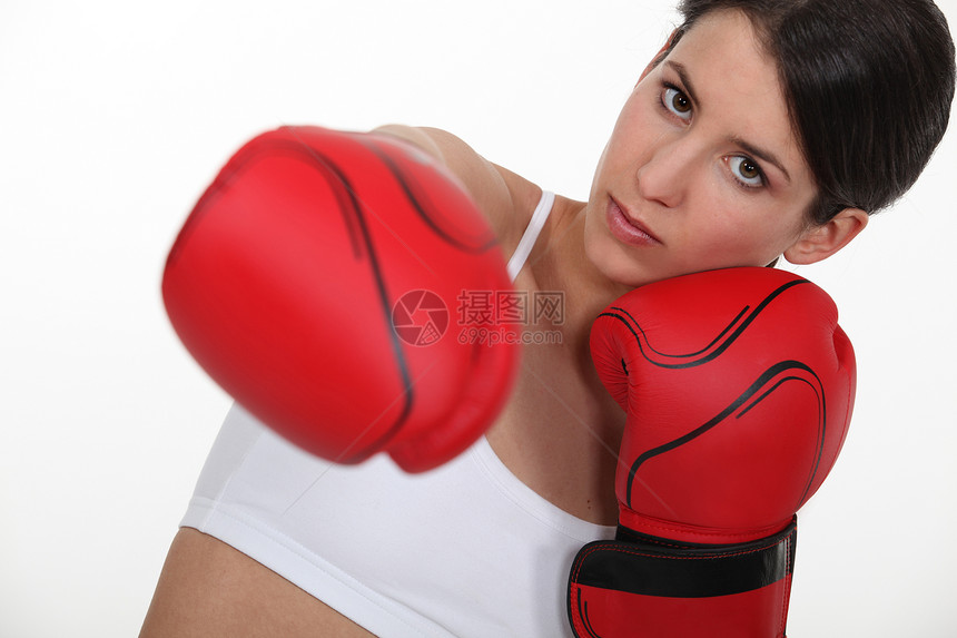 女性拳击女投掷斗争伤害白色青年侵略手套成人胜利运动图片