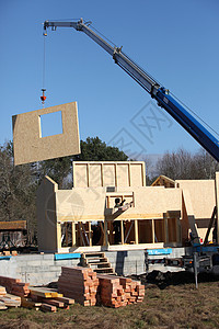 建造木制房屋工程机器补给品材料建设建筑业起重机机械建筑学安全背景图片