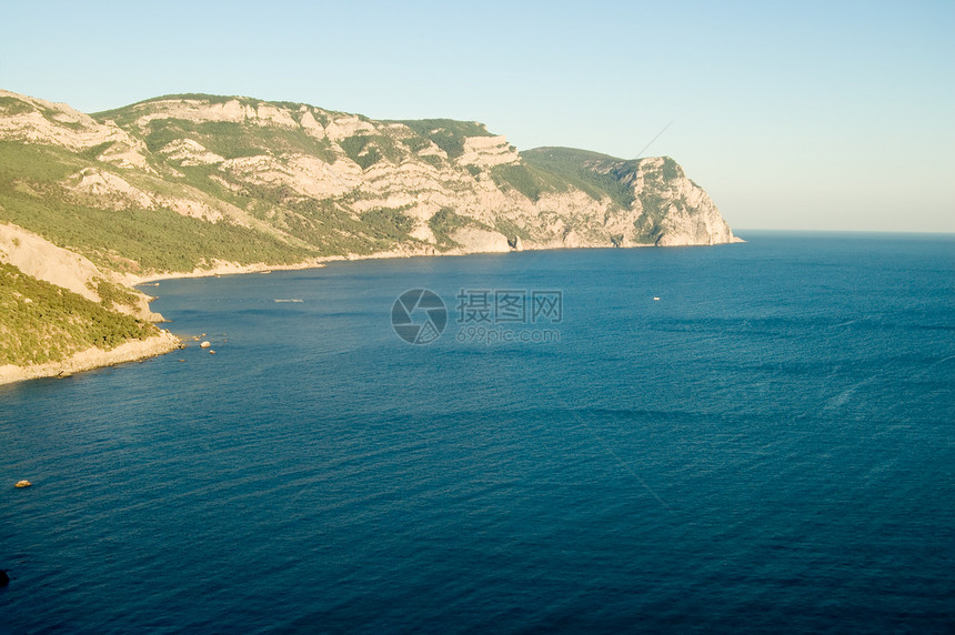 黑海海岸日落晴天支撑爬坡杂草金子高度灌木地平线图片