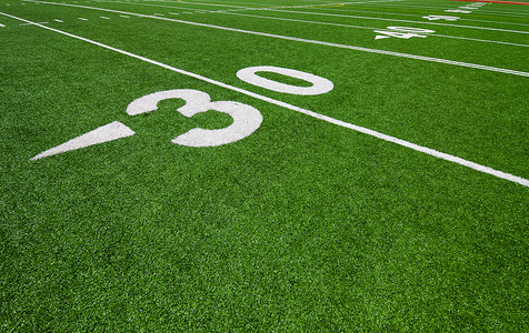 美国大学体育协会三十码线  足球运动草皮单线数字活动绿色草坪运动场体育场标记背景