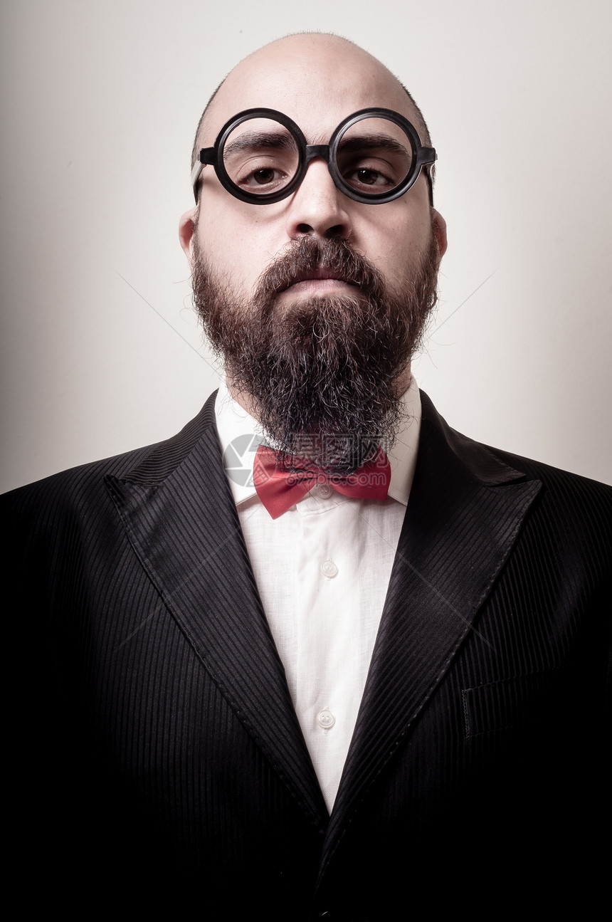 风趣优雅的长胡子男子商务胡须圆形工作室商业领带脱发人士眼镜夹克图片