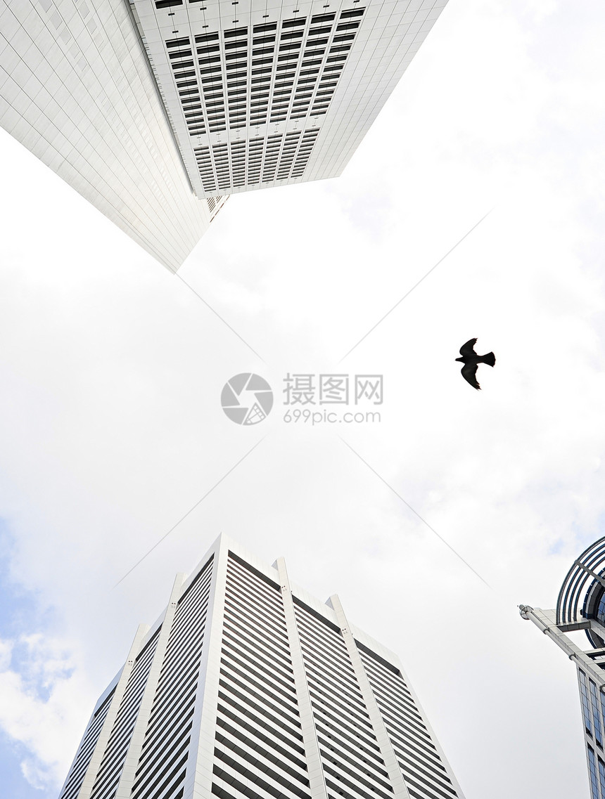 新加坡摩天大楼蓝色飞行生活玻璃窗户商业天空市中心公司金融图片