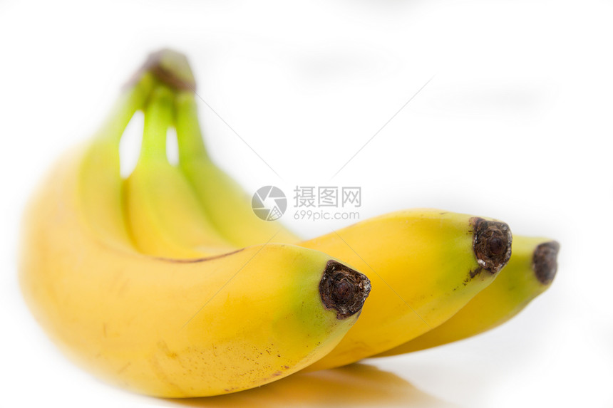 白色背景的新鲜香蕉饮食小路黄色食物剪裁水果组织小吃热带皮肤图片