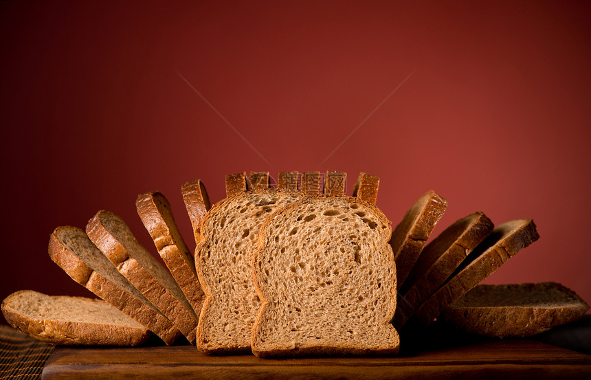 面包切片棕色脆皮食物工作室包子早餐红色粮食图片