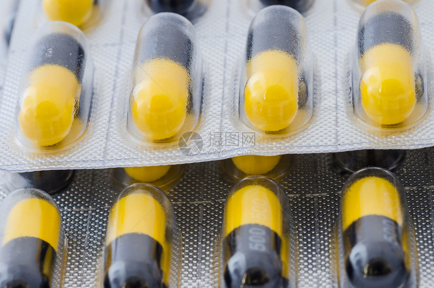 黑色和黄色胶囊团体宏观药品疾病制药剂量药店图片