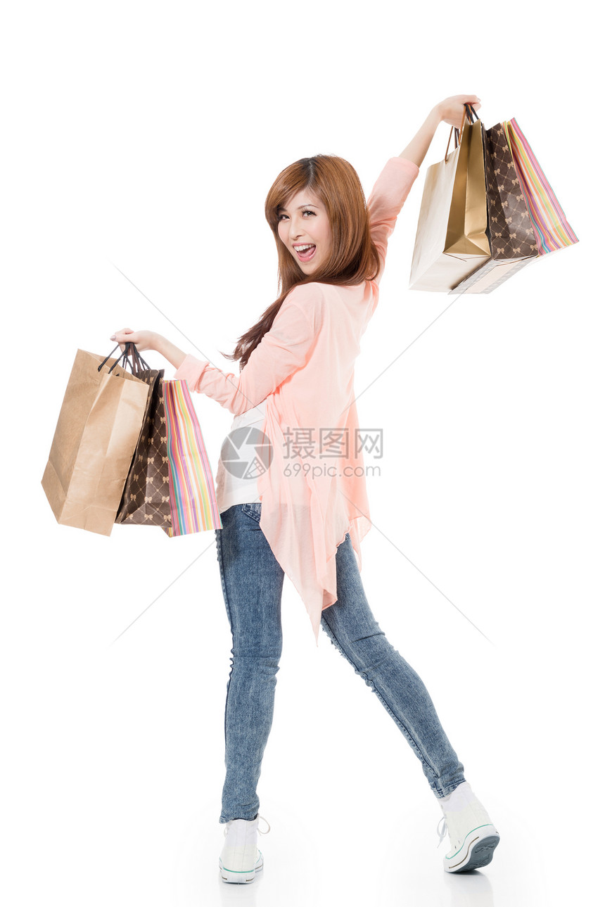 愉快的购物妇女顾客幸福工作室乐趣享受女性购物者消费者喜悦人心图片