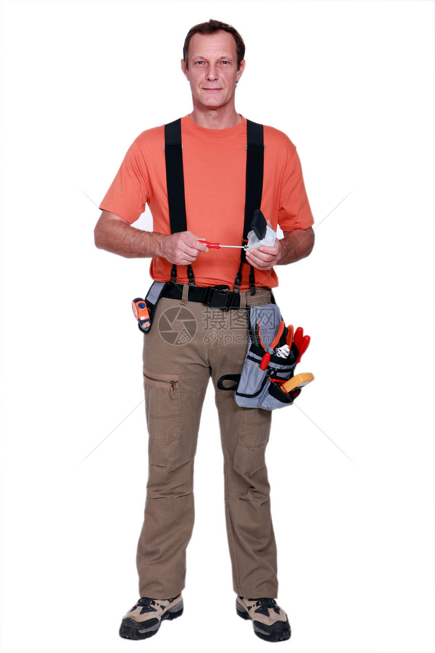 一个杂工测量吊带裤建设者工具修理工男人磁带看门人螺丝刀白色图片