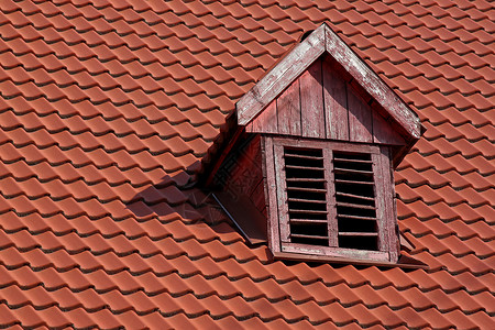 红砖屋顶房子建筑大厦阁楼建筑学维修红色装修背景图片