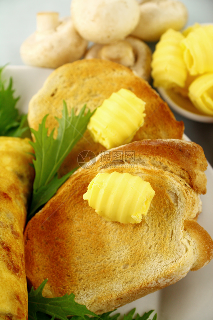 黄油加吐司食物滚动烹饪早餐味道旋钮午餐用餐营养草药图片