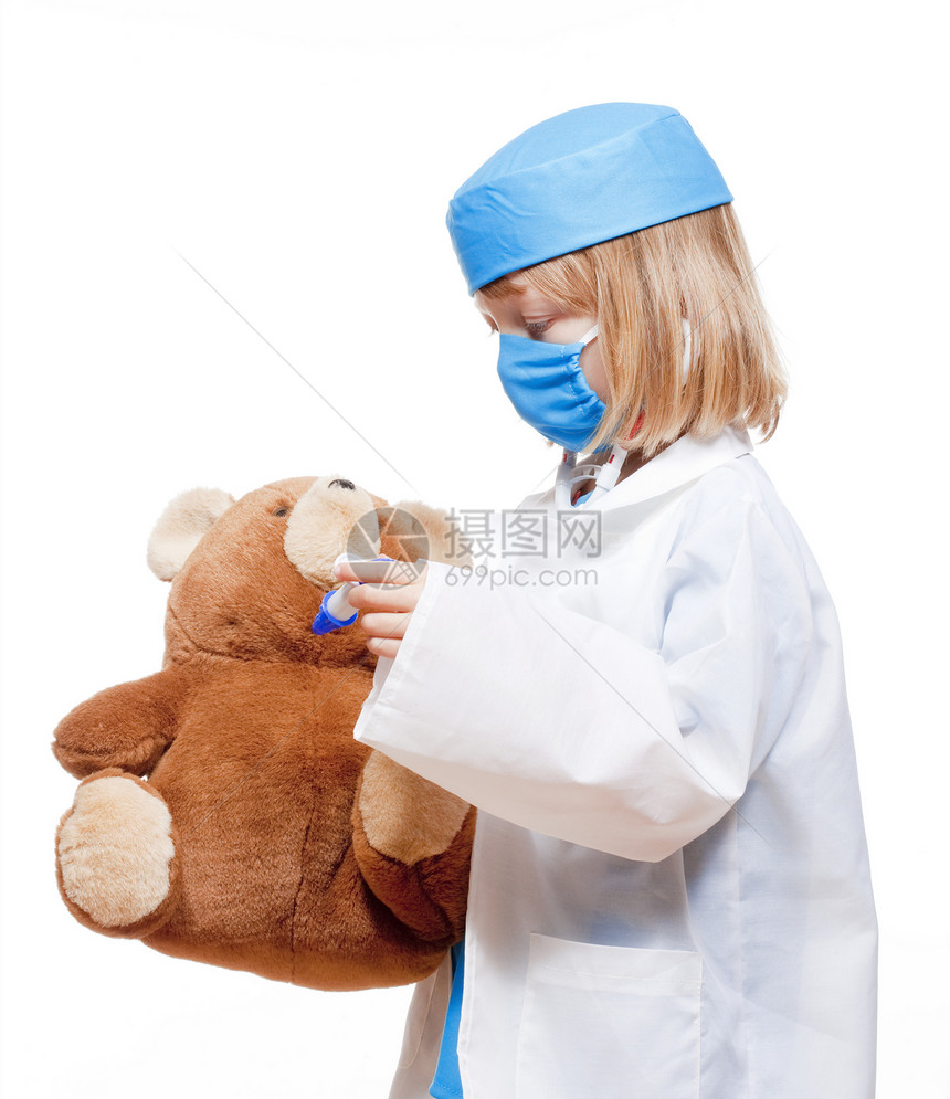 男孩扮演医生考试男生乐趣病人药品白色医疗孩子玩具长发图片