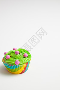 彩色纸杯蛋糕的特写磨砂冰镇装饰甜点蛋糕面包小雨背景图片