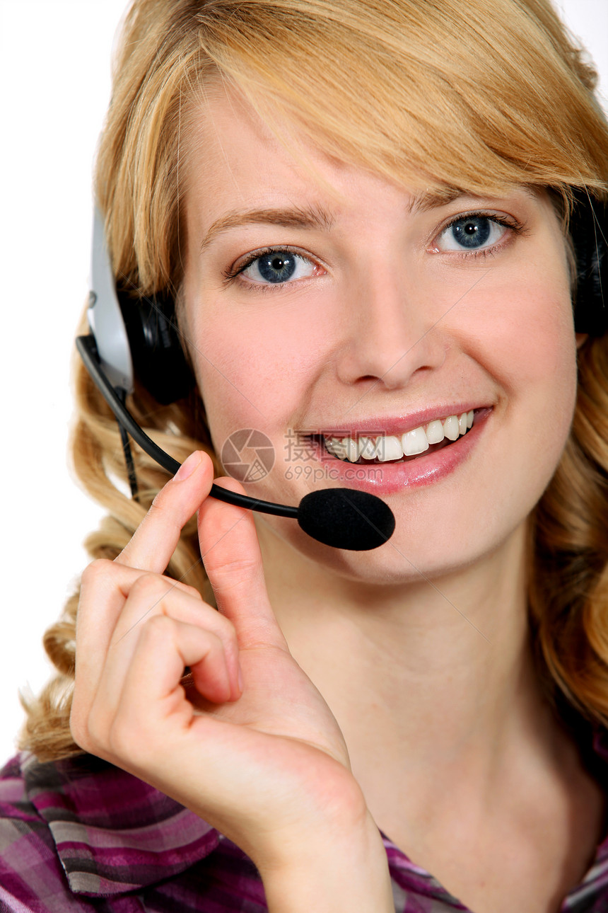 Blond 呼叫中心工人帮助女士经销商耳机讲话女性建设性公司代理人热线图片