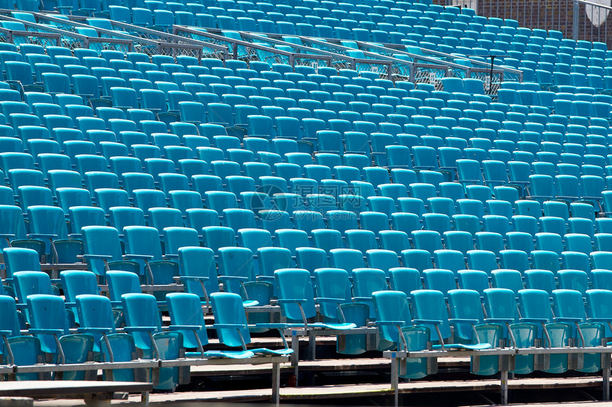 椅子大厅观众会议礼堂塑料蓝色座位音乐会运动民众图片