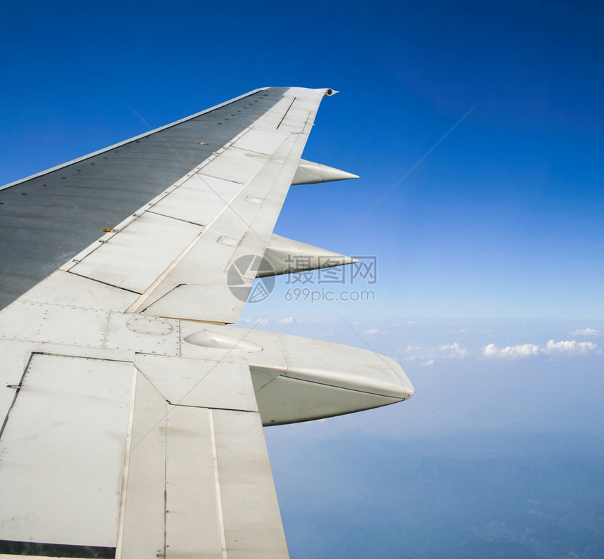 飞机飞行蓝色旅行旅游航空喷射翅膀假期速度窗户航空公司图片