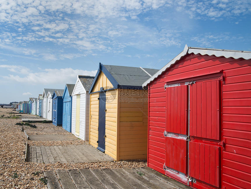 海滩小屋爬坡太阳天空英语退休蓝色长廊海岸王国晴天图片