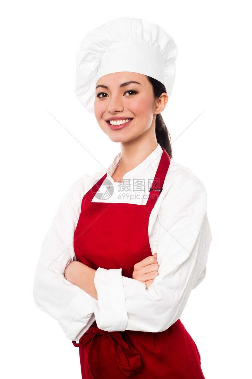 充满自信的年轻女厨师腰部工作室厨房商业餐厅职业工作快乐女性餐饮图片