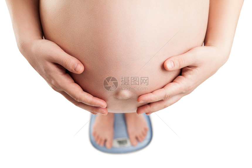 保持体重平衡的孕期妇女图片