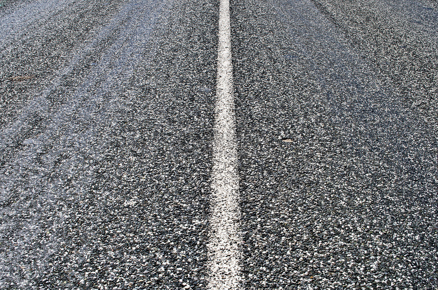 Asfalt路面背景宏观沥青小路标记石头灰色道路崎岖材料图片
