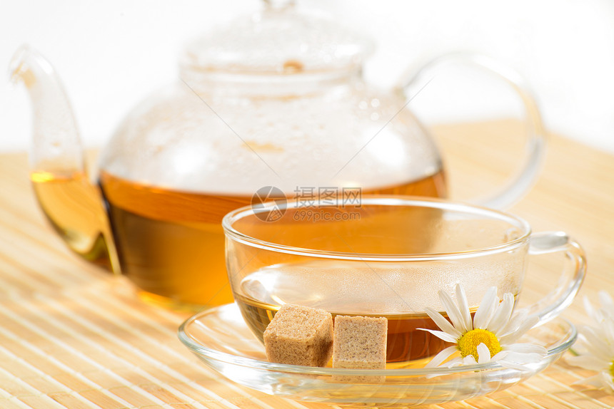 茶杯加香草甘菊茶液体服务卫生早餐礼物植物药品生活叶子照片图片