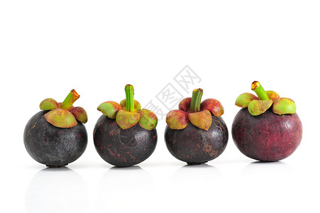 芒果山竹甜食热带气候水果紫色背景图片