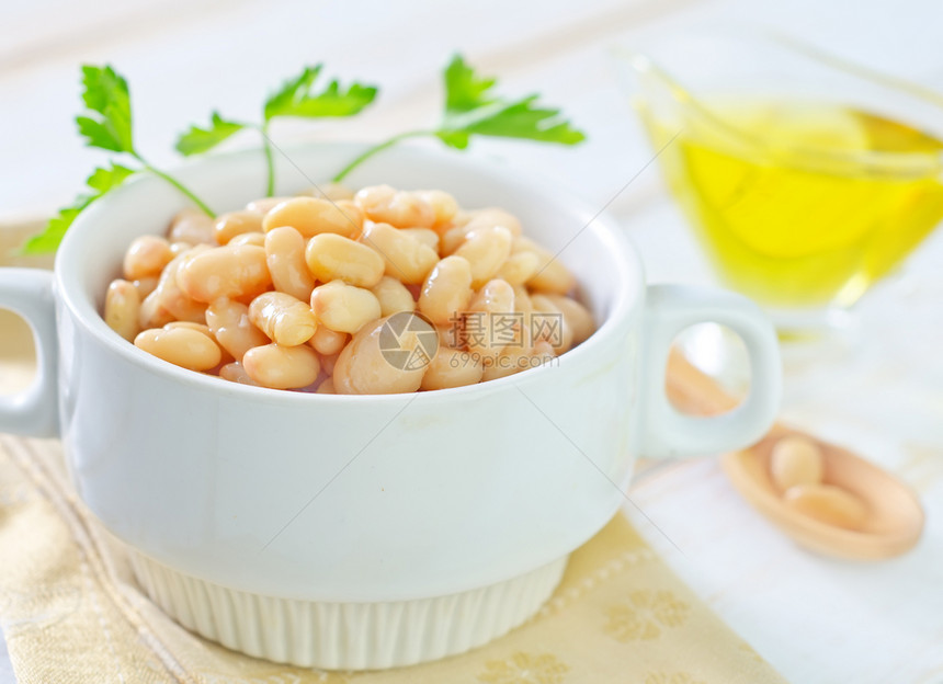 碗中白豆午餐饮食花园豆子木头制品花斑陶瓷种子酱料图片