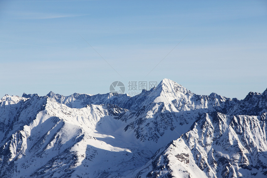 冬季山区岩石旅行气候环境假期季节运动阳光冻结蓝色图片