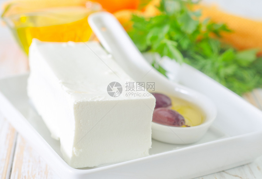 乳酪奶酪美食沙拉奶制品盐渍早餐产品桌子食物山羊木头图片