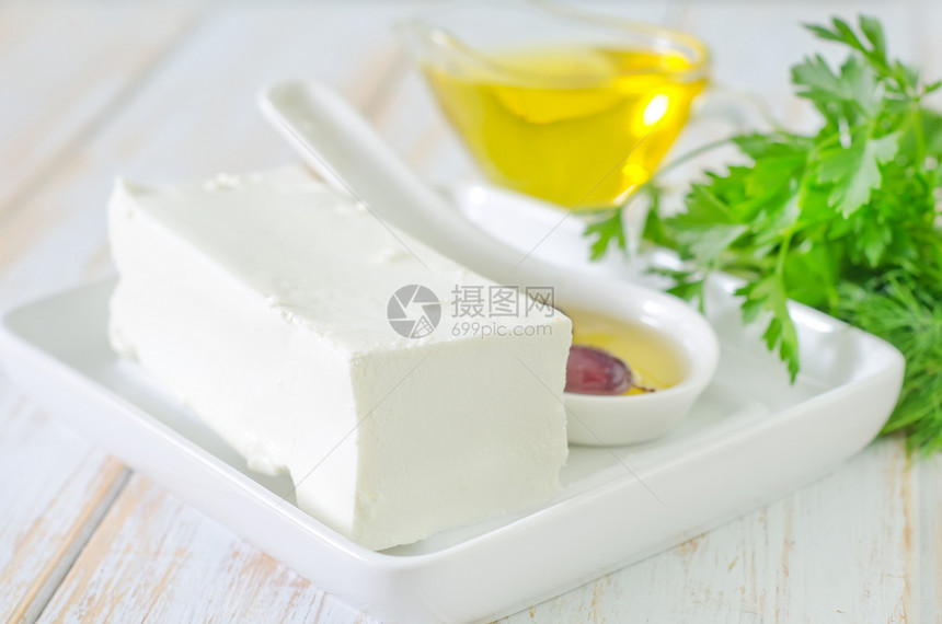 乳酪奶酪盐渍早餐产品美食香料木头叶子奶制品厨房沙拉图片
