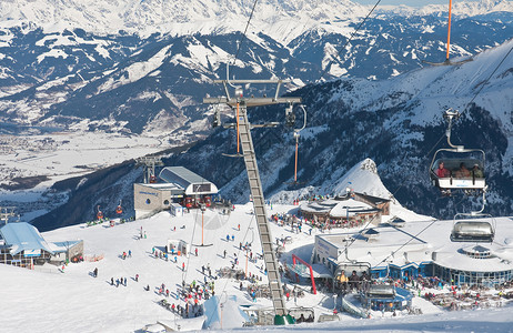 兔斯基我佛慈悲奥地利冰川的Kaprun滑雪度假胜地山脉岩石晴天运动太阳号角缆车电缆高度背景