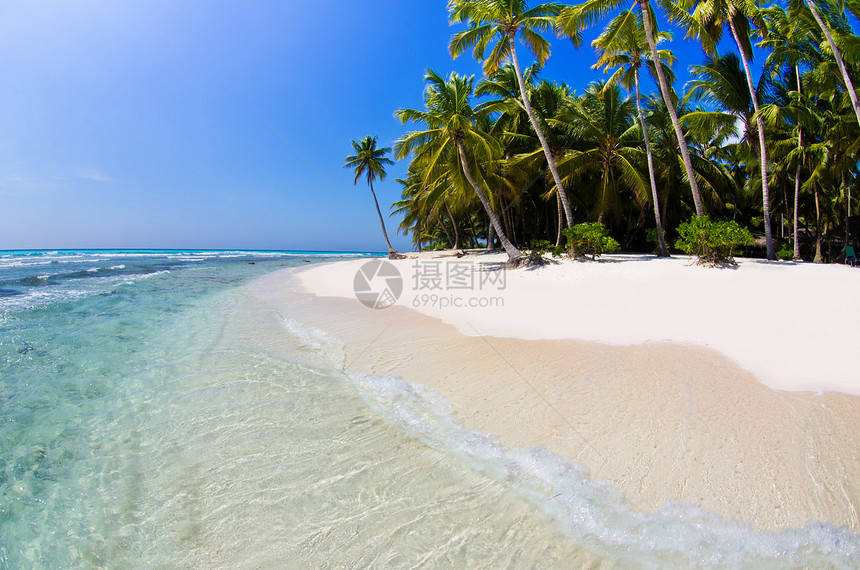 海滩沙滩热带蓝色太阳海景假期阳光海洋海岸旅行天空图片