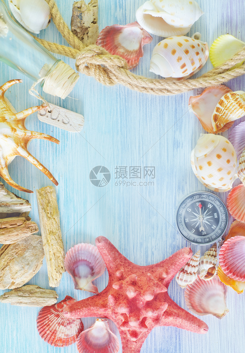 海壳和罗盘框架星星假期绳索艺术宏观旅行墙纸地面海星图片