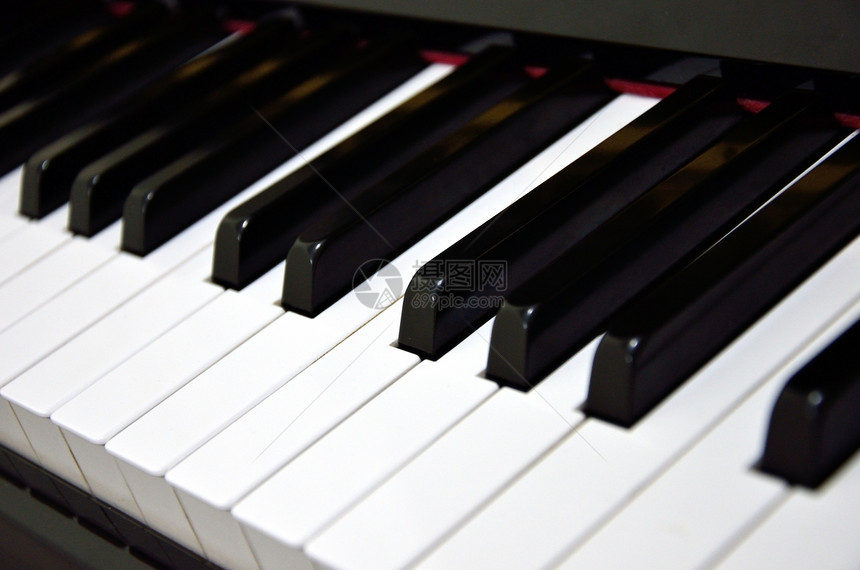 钢琴键背景笔记艺术家爵士乐旋律器官乐器学习音乐娱乐音乐会图片