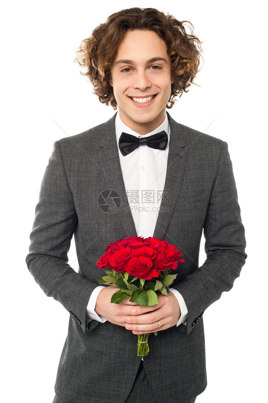 穿着礼服的Groom 用花束装扮套装快乐仪式丈夫传统婚姻玫瑰冒充庆典男性图片