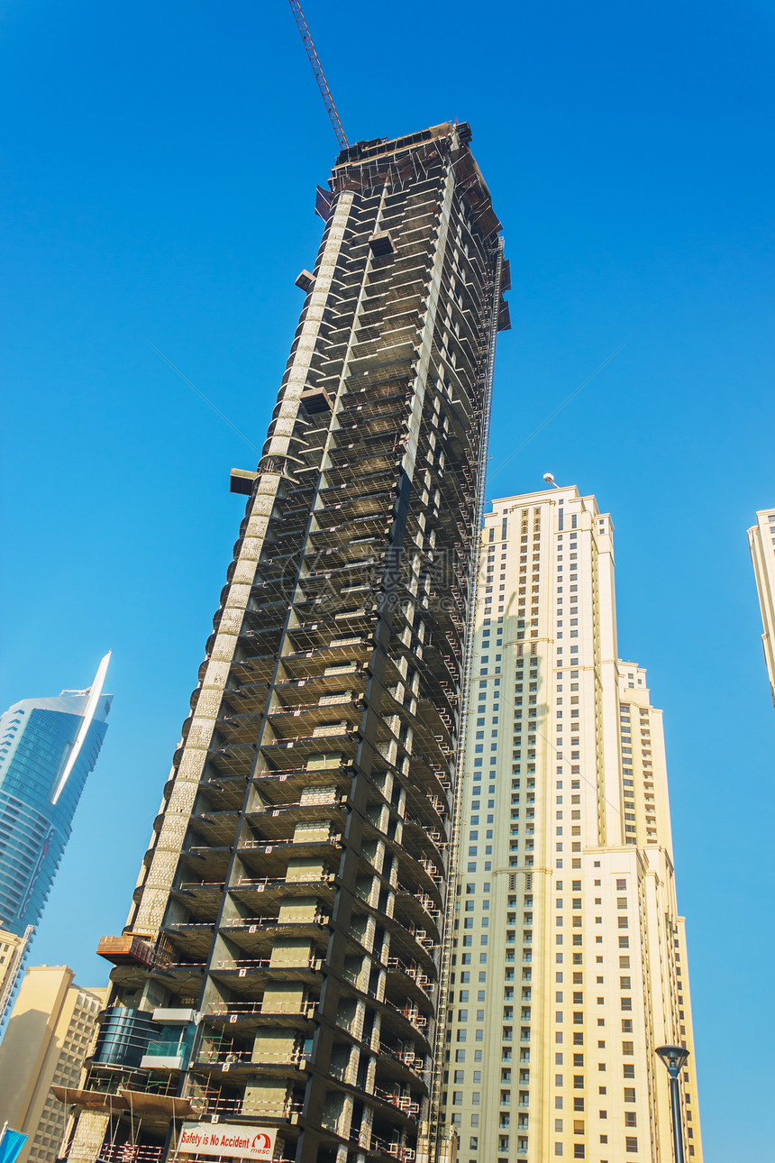 阿联酋迪拜高楼建筑和街道窗户假期奢华建筑学玻璃财富金融摩天大楼商业场景图片