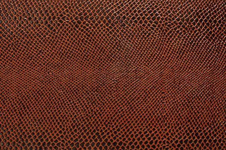 人造皮革的纹理背景棕色宏观纺织品衣服织物蜥蜴皮肤浮雕艺术材料背景图片