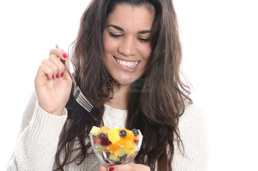 女青年食用新鲜水果沙拉鲜果沙拉头发白色面孔女士吸引力图片
