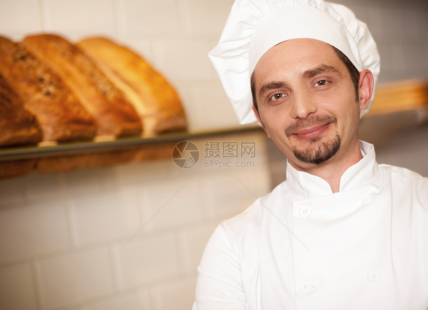 面包店老板穿着厨师服图片