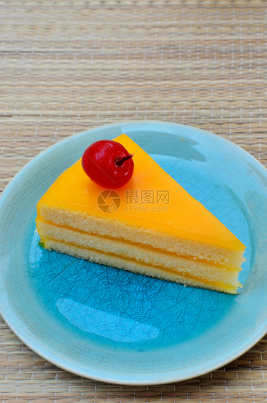 蓝菜中的橙色蛋糕托盘农村国家甜点水果食物味道咖啡馆餐厅美食图片