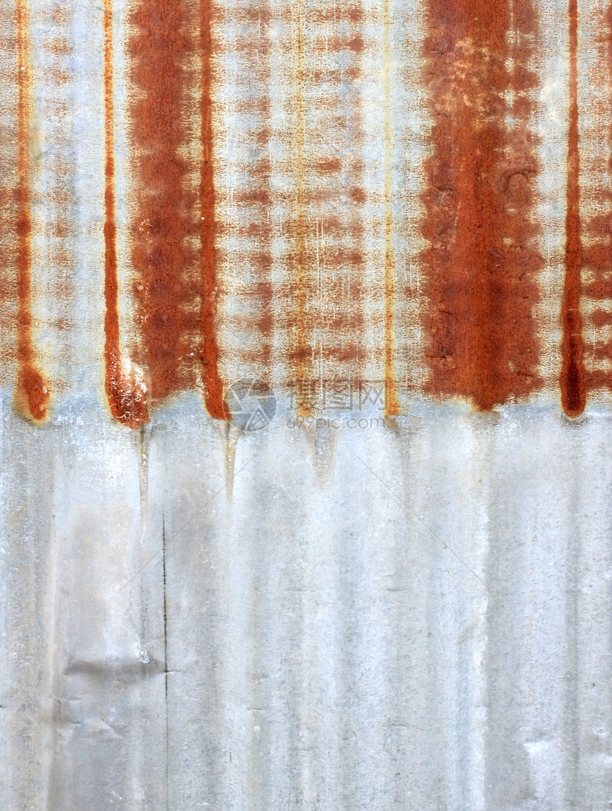 生锈的铁质金属质料栅栏海浪构造瓦楞材料墙纸技术瓷砖平铺橙子图片