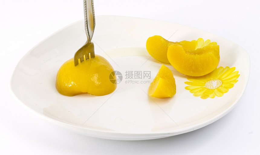 糖浆中的桃子白色小吃营养食物甜点水果黄色图片