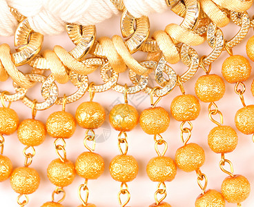 金金珍珠 有花冠皱纹羊皮纸奢华珍珠玩具项链珠宝宝石花边背景图片