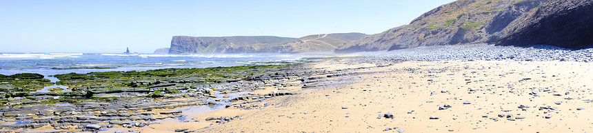葡萄牙岩礁和海洋海藻海浪河谷石头岩石雕像海滩图片