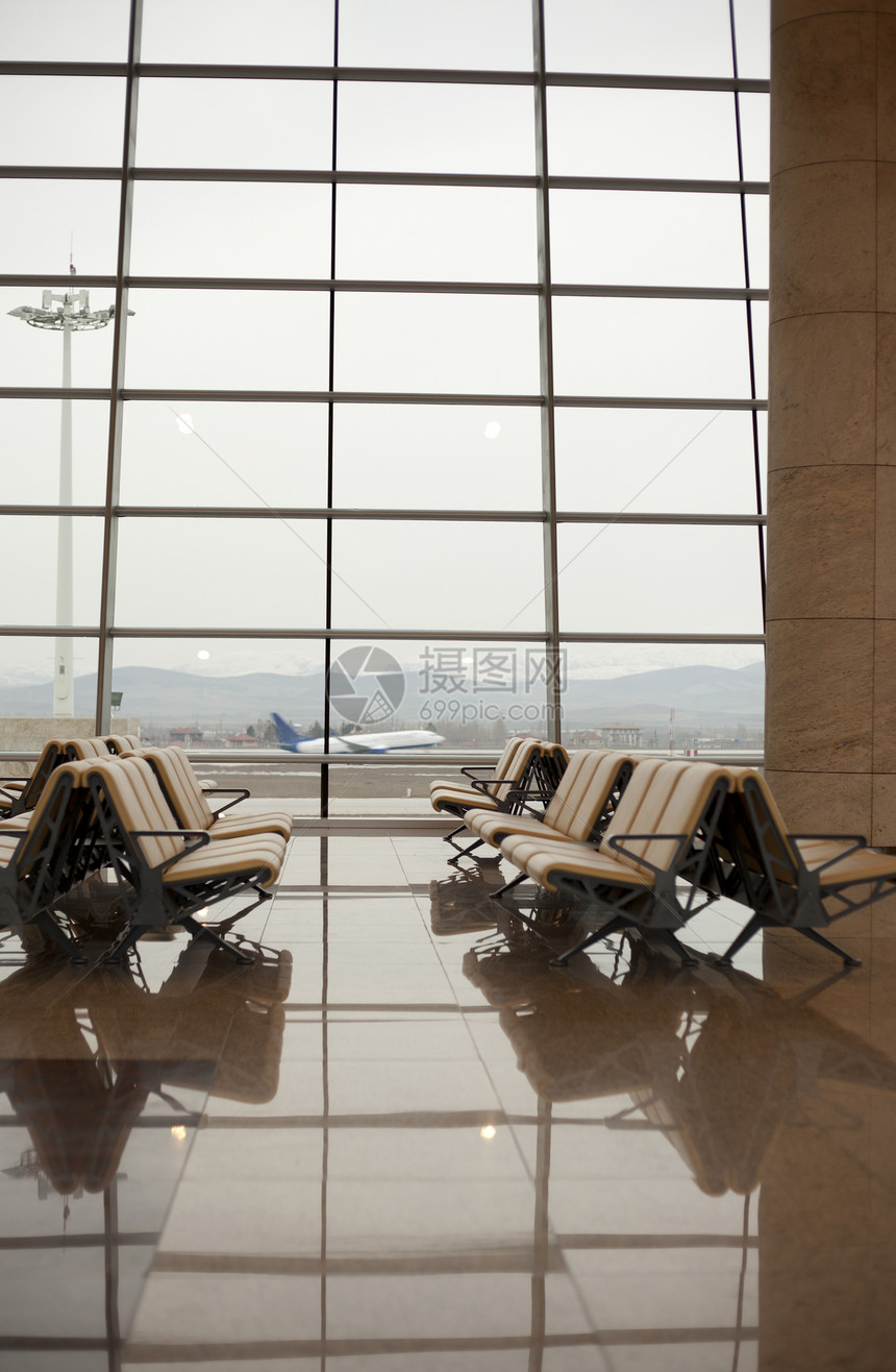 在机场有座位的候诊室运输大堂飞机乘客地面车站旅游飞机场旅行商业图片