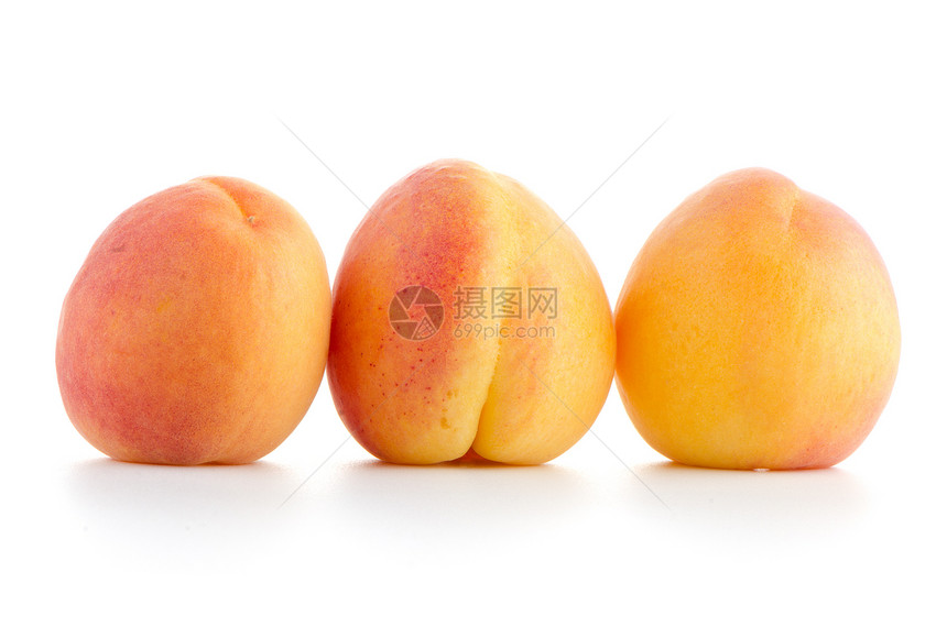 三个甜甜桃子剪裁农业宏观水果橙子白色甜点阴影工作室图片
