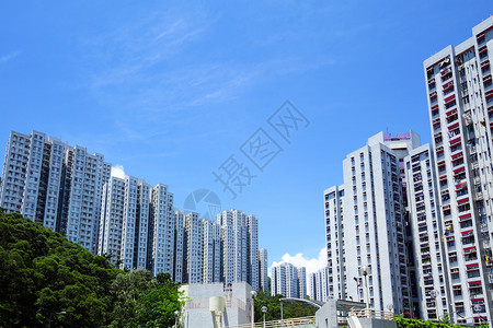 香港的公屋城市民众财产蓝色土地住宅建筑人群天空窗户背景图片