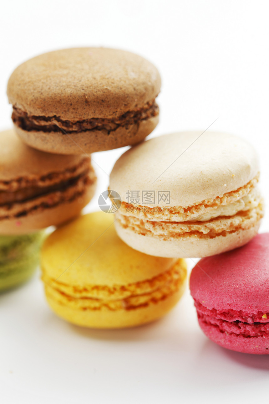 色彩多彩的马卡龙美食饼干奶油蛋糕食物甜点糕点白色糖果粉色图片