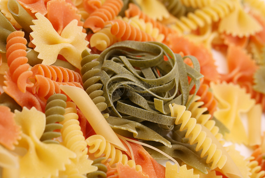 和不同的意大利面条 请见此饺子绿色派对营养品三色黄色螺旋食物橙子图片