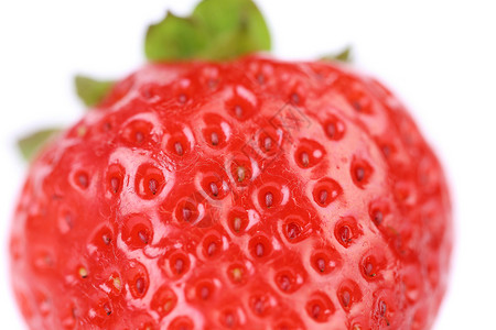 新鲜红草莓的特写细节宏观红色树叶生产食物浆果营养绿色背景图片