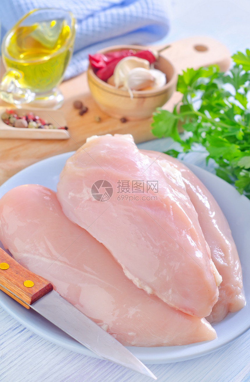 鸡片胡椒家禽洋葱肌肉木头烹饪胸部食物正方形鱼片图片